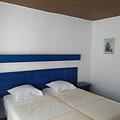 room.images[0].caption