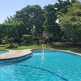 City Charm & Poolside Peace -Gated