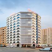 OYO Townhouse 156 Rose Hotel Apartments.