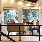 Whispering Pines Hotel & Residences