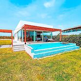 HOP Odaiba Exclusiva Laguna y Playa en Chincha