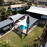 Rosewood Rustic Refuge Pool Outdoor Dining Backyard