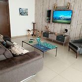 New Apartment in Tilal Fanar Resort, Pools,tennis
