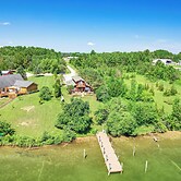 Riverfront Cheboygan Home w/ Dock ~ 4 Mi to Town!