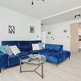 Wroclaw Dark Blue Apartment by Renters