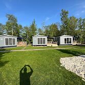 Chalet With Play Equipment, on a Holiday Park