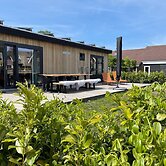 Chalet by Water in Idskenhuizen Recreation Park