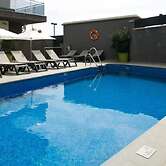 Belvilla by OYO Apartamento con Patio