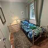 Cosy and Secluded Brook-side Lodge