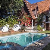 Natureza-piscina-lareira-Brazilan Corner