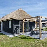 Thatched Villa in a Holiday Park