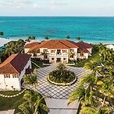 Secluded Serenity: Beachfront Estate On Private Acres