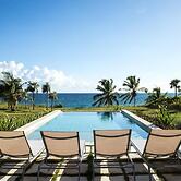 Dream Villa: Private Oasis Above Pink Sand Beach