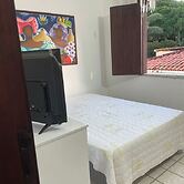 Quarto cama queen ar condicionado