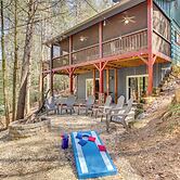 Secluded Cherry Log Cabin w/ Hot Tub + Swings!