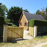 Wooden House by Beach Near Barneville