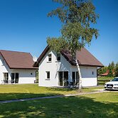 Brick House in Ledzin Near Dutch Windmill