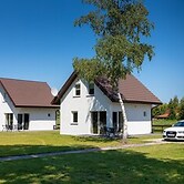 Brick House in Ledzin Near Dutch Windmill