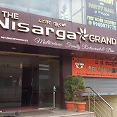 the Nisarga Grand   boarding & lodging