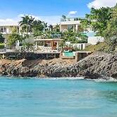 Gorgeous Beach House Perched Right Over the Ocean