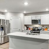1 Mi to Golf: Quiet Waukee Home w/ Fireplace!