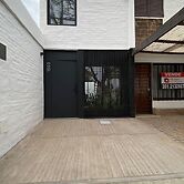 Duplex en el Cerro de Las Rosas by Lugar