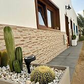 Bayside La Graciosita Traditional Home