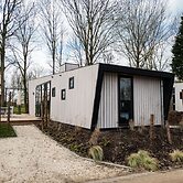 Modern Chalet by the River Maas