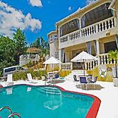 Sea Symphony Barbados - 6 B R Beachfront Villa w Staff