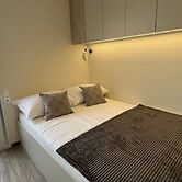 Tranquil Tides Drage Mobile Home With Terrace and Sea View