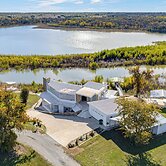 Dock & Fire Pit: Riverfront Runaway Bay Retreat