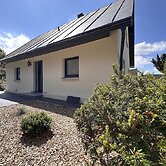 Freistehendes Haus mit Ofen, Terrasse und Garten
