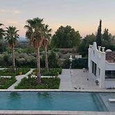 Chambre Luxe Piscine Jardin vue Solarium Palmeraie
