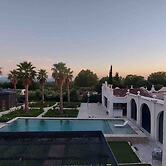 Petite Chambre Confort Piscine Jardin vue Palmraie