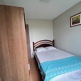 Quarto Privativo com Suite e Ar