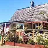 Serene Lakehouse With Rowing Boat