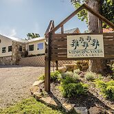 Whispering Woods Cabins & Grill