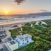 Beachfront 2BR w/ Deck, Views & Direct Sand Access Strand Way A