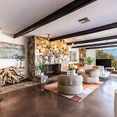 Stylish Hillside Retreat with Pool & Views