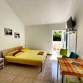 Lush Studio Apartment by the Beach