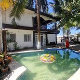 Casa Columpios playa alberca terraza familiar