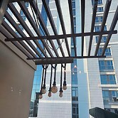 Modern 1BR w Pool and Parking At Roxana Residence