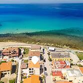 Large Seaside Apartment With Patio in Lu Bagnu