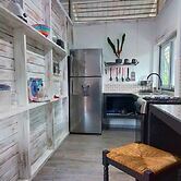 Casitas en la Jungla - Luz Tropical