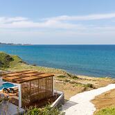 Villa Akroyiali Seafront Serenity Shared Pool