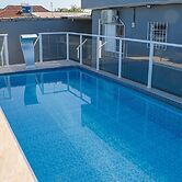 Casa Completa com Piscina e Churrasq pet Friendly