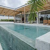 Tropical Poolside Retreat by Sea N' Rent