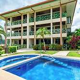 Elegant Condo with Brand-New Fixtures, Shaded Tropical Terrace, and Se