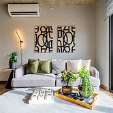 w Elegant 2BR Apartment in the Heart of Centriqo