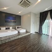 Capital O 91170 Kurau Bay Hotel